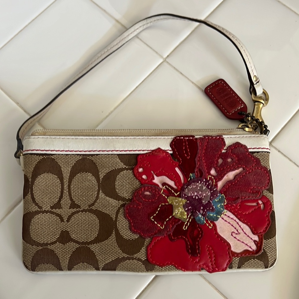 Rare Coach wristlet signature C  with flower 7x4”